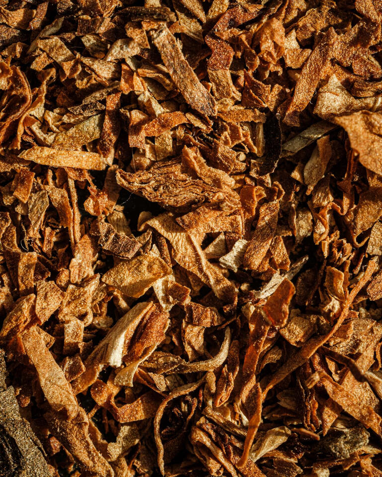 Macro photo of Natural American Spirit cigarette tobacco.
