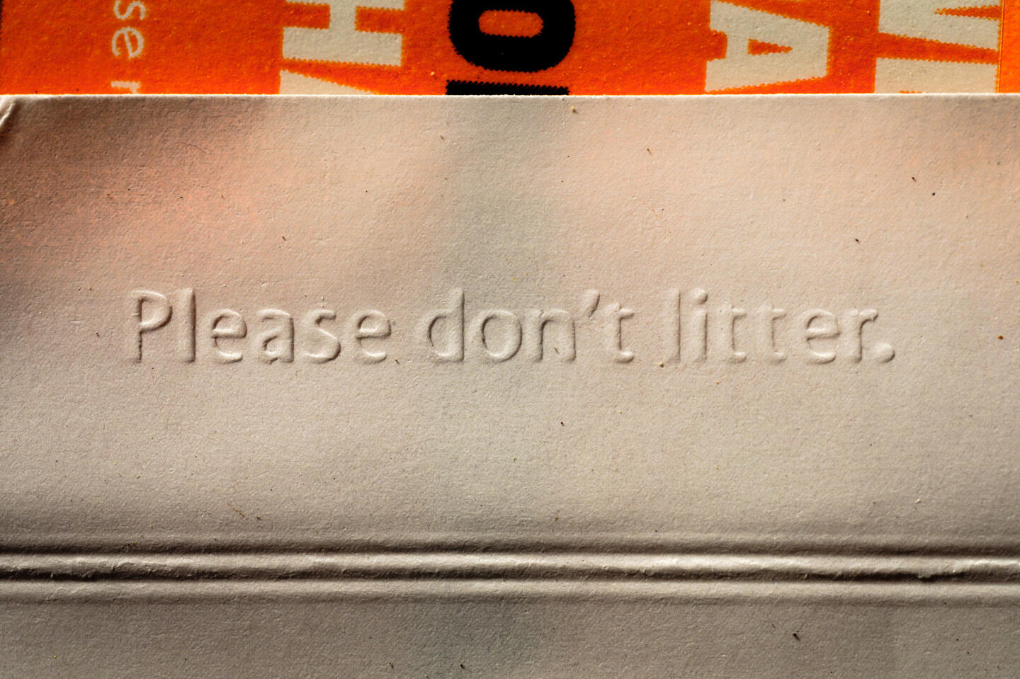 "Please Don't Litter" reminder message on Natural American Spirit cigarette pack wrapper.